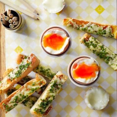 Toast sticks with eggs in egg cups